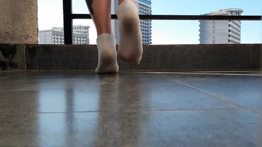 The fetish of dirty white socks. Dominatrix Nika gets her white socks dirty on purpose for a dirty slave boy.