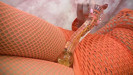 Hot teen in fishnet plays with her vibrator