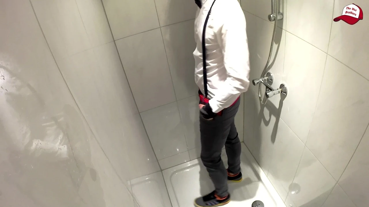 Wet gentleman clothes, white and shiny, wet jeans