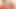 Brunette ladyboy with high heels strips her red panties and