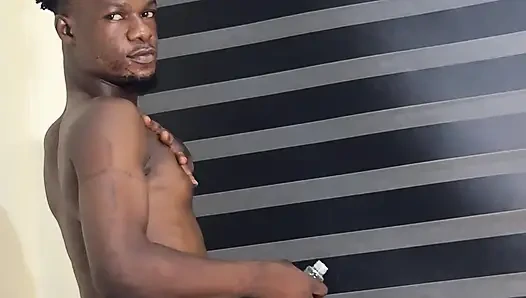 An african boy touching nd caressing himself while being cammed by friend