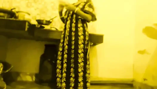 Busty MILF Desi Bhabi Has No Idea Her young Devar see Secretly in the kitchen room.