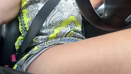 The beautiful and elegant stepmom Michelle drives to work in the morning.