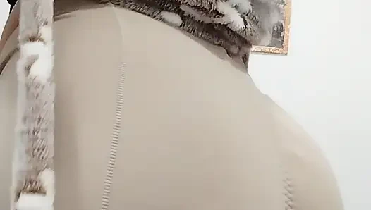 She dances and displays her charms