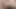 A mature milf's vagina makes noise due to the moisture after a shower.