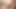 Seksi elbisesini çıkarıyor ve mastürbasyon yapmaya başlıyor