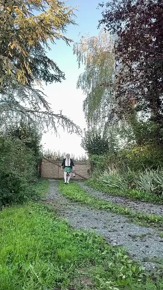 Dressed in a little plaid pleated skirt for a night out