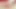Güzel karmella bir yapay penis için uzun bacaklarını açar