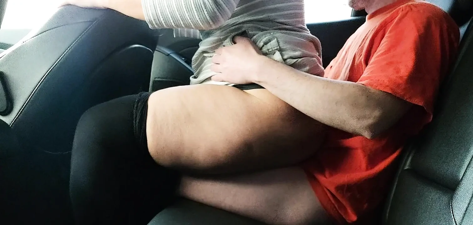 Stepmom rides her stepson in the car in public and moans with pleasure