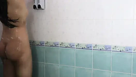 Thai teenager showers, showing off her pink nipples and smooth vagina. Real Thai Solo