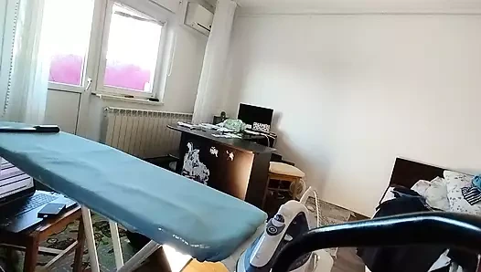 Amateur woman doing housework naked Sexy and naughty wife trying on clothes she cuts.