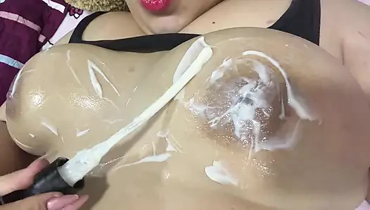 Mom massages her big tits with a very delicious cream