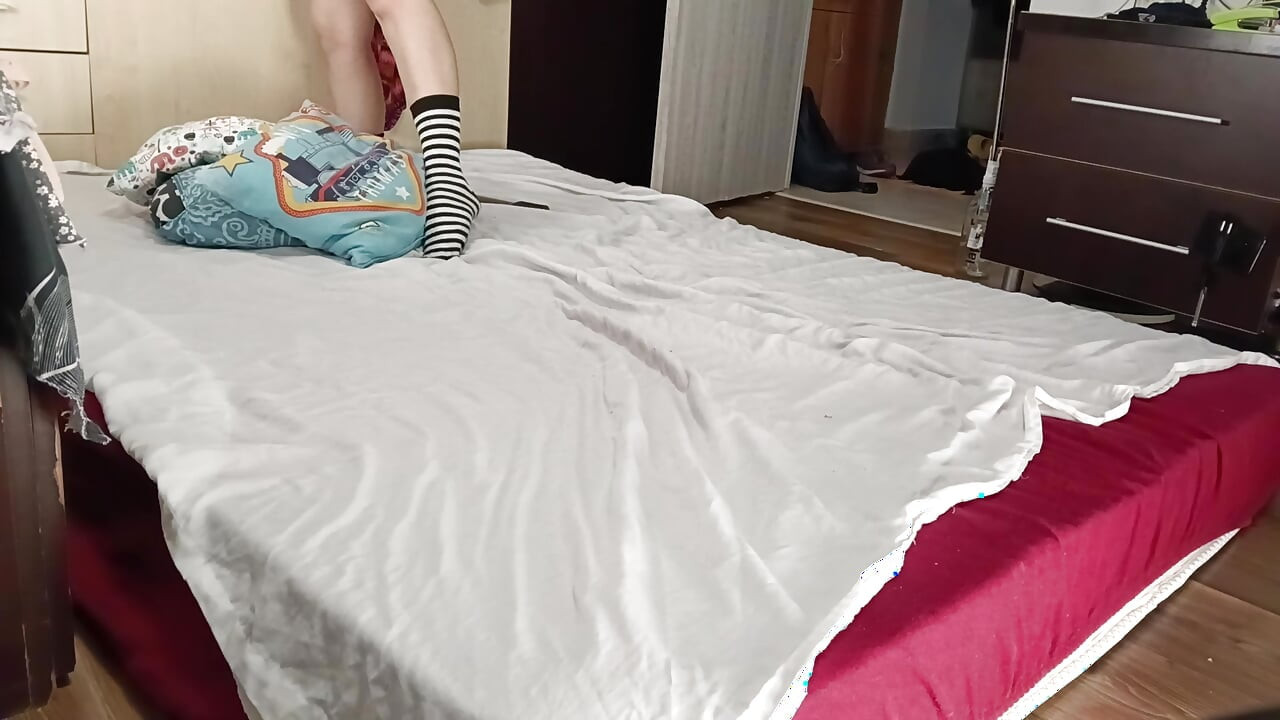 Sexy brunette doing naked chores around the house.
