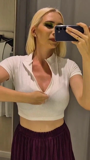 Key moment from "Trying on completely transparent clothes in the fitting room. Look at my boobs in a public place."
