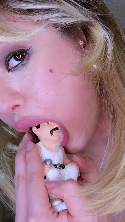 MINIATURE MAN DEVOURED BY GIANT MINIATURE MAN HEAD INSIDE AND CHOKING BY | Clip 1