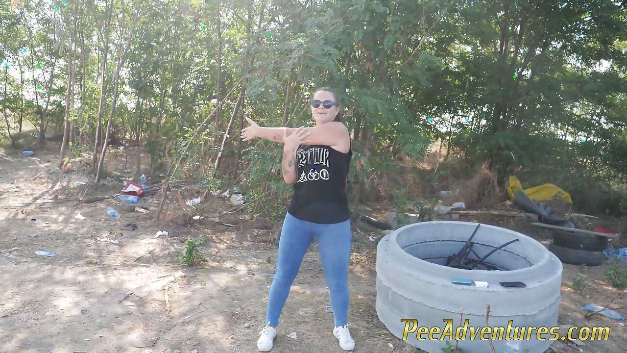 Pissing in her jeans while exercising outdoor