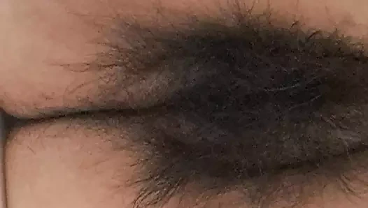 Mature milf's fat, open, hairy pussy seen from below