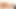 Siyah külotlu bronzlaşmış ladyboy tek başına mastürbasyon yapıyor