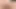 Bağ gibi dalgalanmak için büyük götünü sallıyor ve bir amcık piercingi ortaya çıkarıyor.