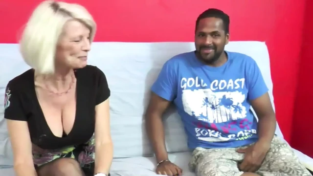 Granny 72 Years Old with a Pussy Full of Piercings Gets Fucked on the Couch by a Young Black