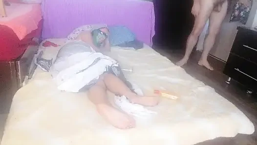 Sensual massage of a hot couple with oil on the body.