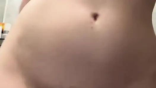 Wet girl caresses her body in the shower