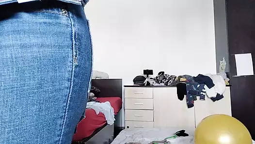 An amateur has fun trying on clothes she has cut. An amateur dances naked in the house.