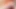 Pirsingli meme uçlu orta yaşlı seksi kadın çıplak yatarken minyon göğüsleriyle oynuyor