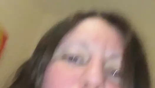 close up filmed on iphone wearing stockings and sexy lingerie and dildoing tight bald pussy