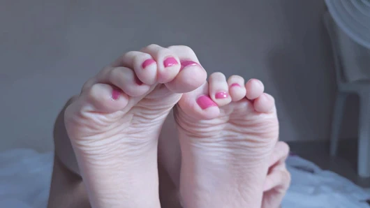 Sensual Foot Tease in Soft Lighting - Elegant & Erotic Play