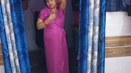 Cute Indian couple secretly having sex in red nightie