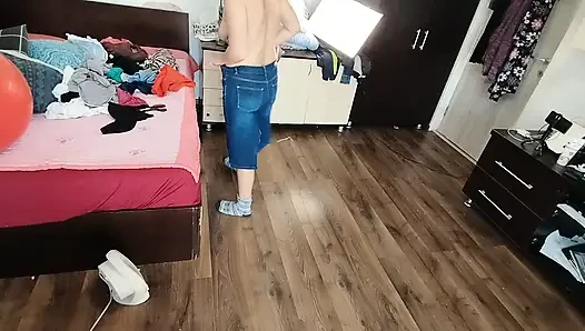 Amateur wife enjoys trying on clothes and cutting them.