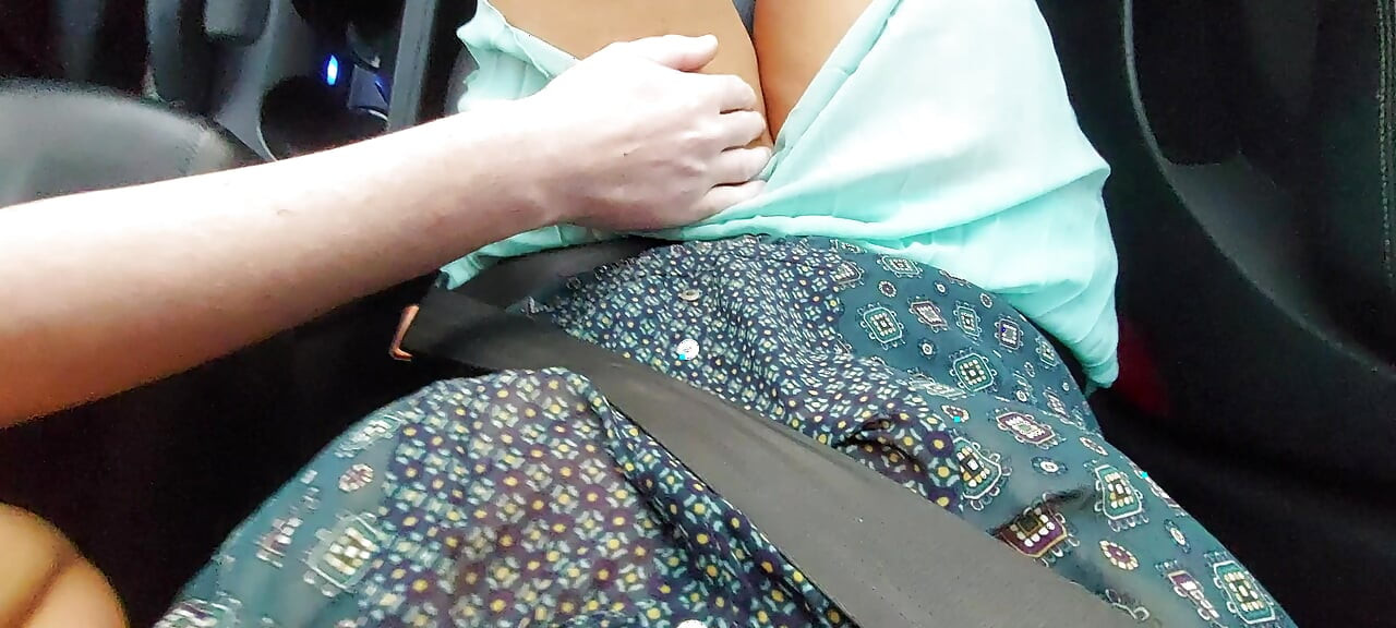 Mature aunt teases her stepson with her sexy legs in the car.