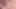 A naked woman with a joyful expression in orgasm on the bed