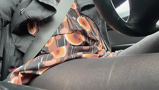 Elegant stepmom drives to the office wearing tights and a beautiful dress