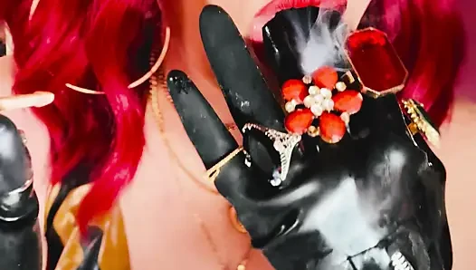 The Beautiful Rubber Beauty Tina Snua Smoking A Cigarette Using A Holder - Smoker Latex Gloves Rings Jewellery