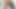 Seksi bronzlaşmış ve solgun yağlanmış lezbiyen vücutları birlikte