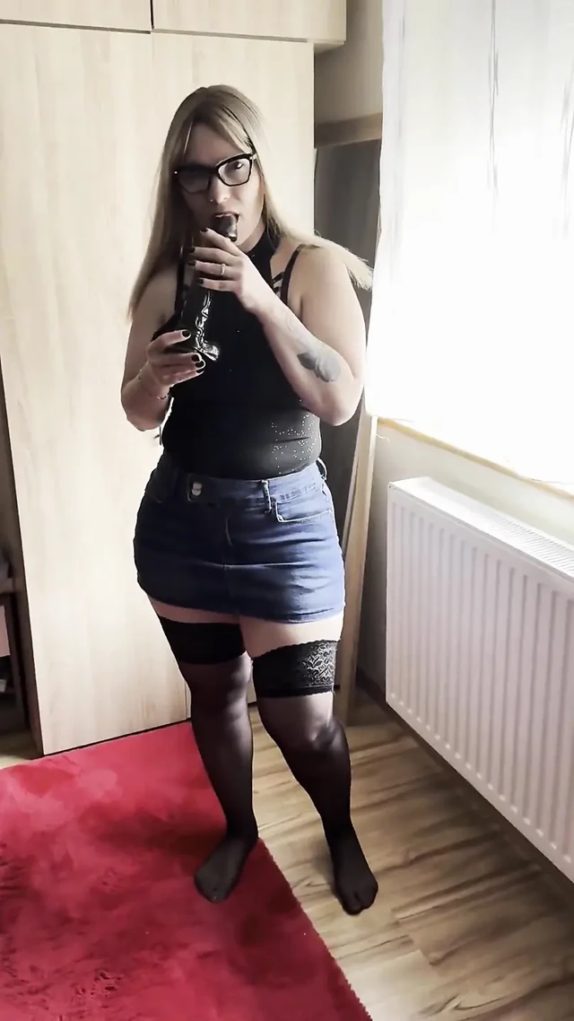 Masturbating with a Huge Black Cock in a Denim Miniskirt