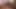 Seksi kaltak iki büyük yarağa ateşli bir elle muamele çekiyor ve ağzına boşalıyor