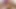 Sarışın orta yaşlı seksi kadın vibratörle klitorisini okşuyor