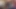 Seksi uzun bacaklı en ateşli sarışın Chrissy tıraşlı amcığını göstermek için kısa mini etek altında minik tangasıyla sahte fotoğraf çekiminde