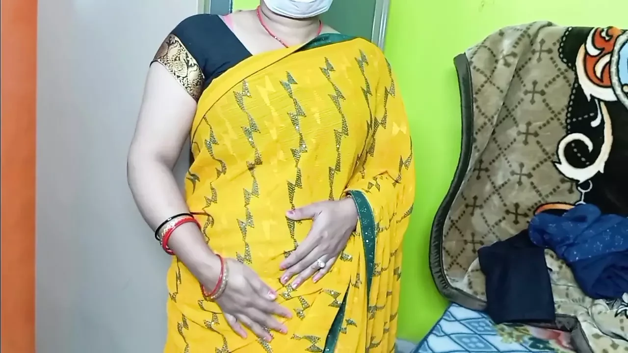 Indian Beautiful Bhabhi in Yellow Color Sari.