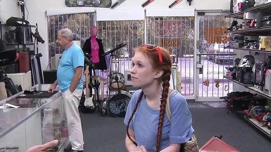 Little redhead temptress earns money by fucking in pawnshop