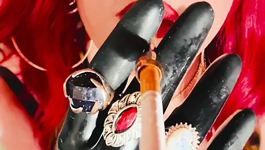 The Beautiful Rubber Beauty Tina Snua Smoking A Cigarette Using A Holder - Smoker Latex Gloves Rings Jewellery