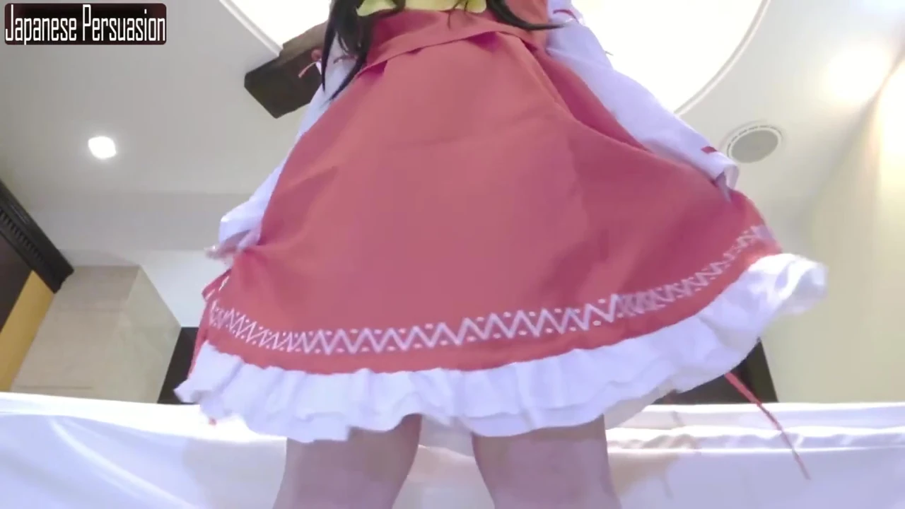 Slender Downer Style Cosplayer Shows Her Quiet Charm While Playing a Reimu Shrine Maiden Role Angle1