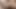 A mature milf's vagina makes noise due to the moisture after a shower.