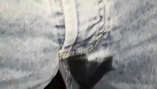 Pissing peeing piss on trousers jeans
