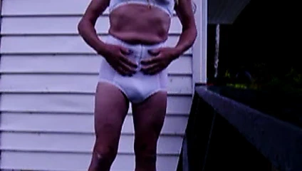 Jen jerks off and cums in white lingerie on the deck