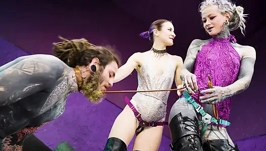 Inked Submissive Boy Double-Pegged Into Submission by Two Ruthless Dommes