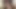 Travesti corsetlovercd mastürbasyon yapıyor ve fildişi ve siyah iç çamaşırlı boşalıyor